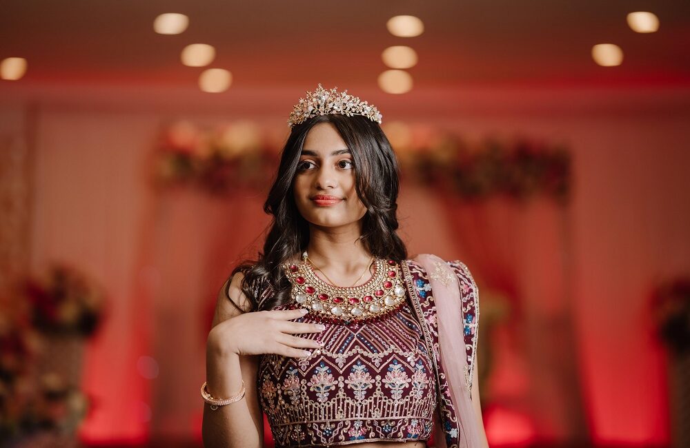 Ananyas Professional Sweet 16 photographer capturing an elegant portrait of a teenage girl wearing a crown at a Sweet 16 celebration in Floral Park, New York